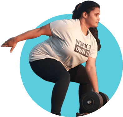 A overweight woman wearing an oversized t-shirt lifting dumbells