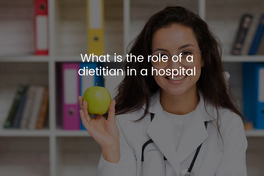 dietitian holding apple in hospital room