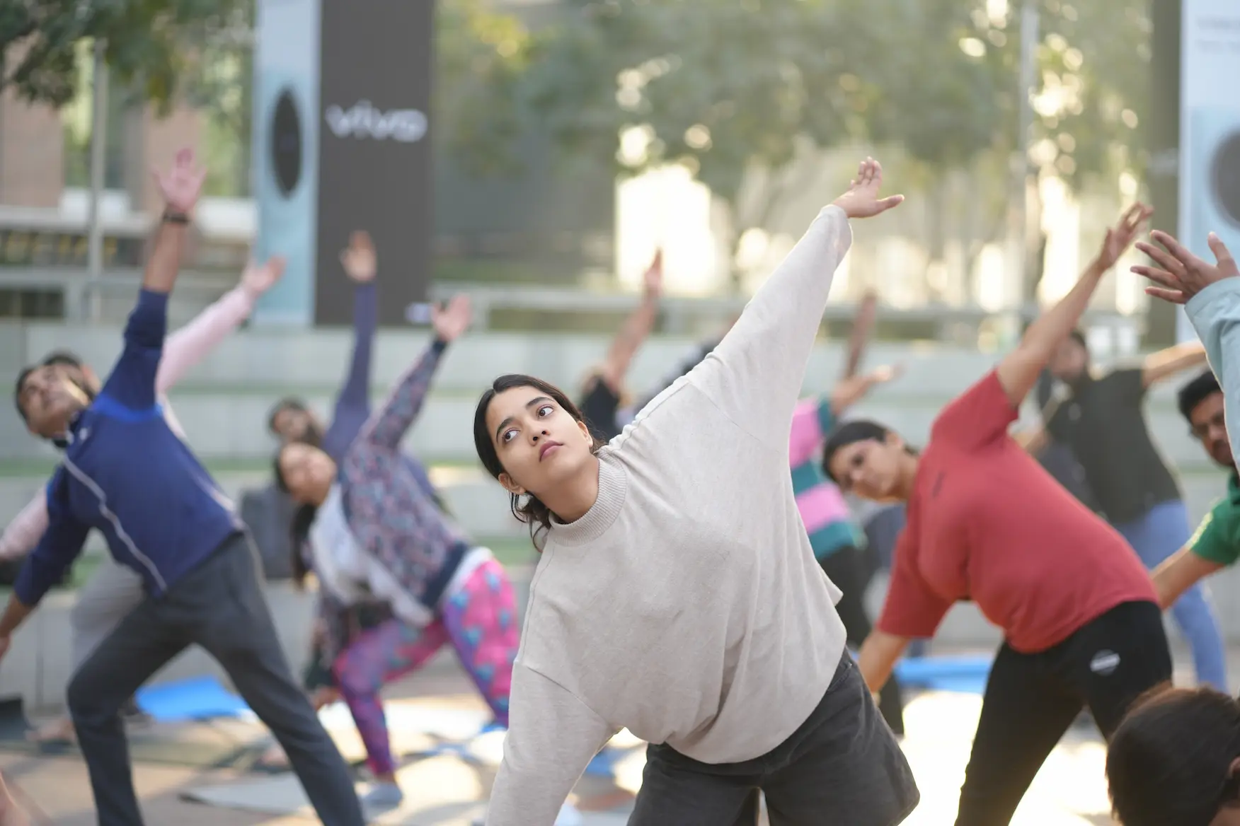 girl performing yoga in findyourfit gurugram wellness event